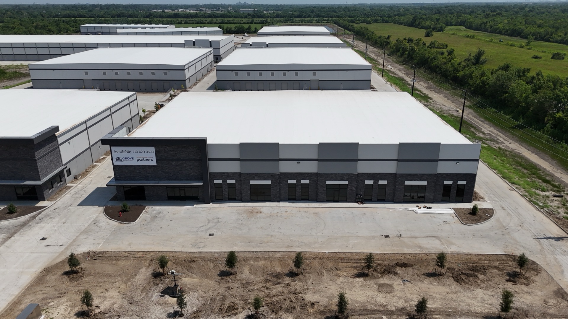 Building 1 — aerial front view, July 2026