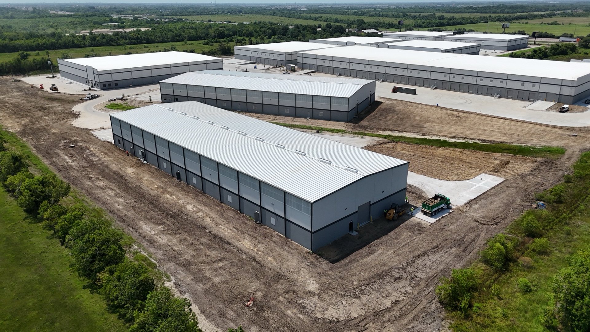 Building 9 — aerial view, July 2026